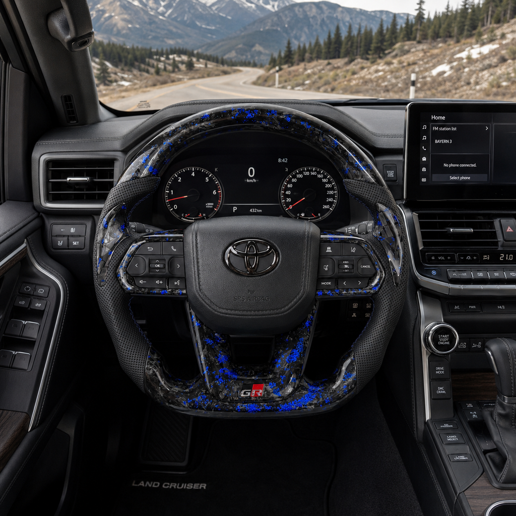 Toyota Land Cruiser LC300 forged carbon style steering wheel with blue flake carbon finish perforated leather grips and GR sport inspired design by CJ Mod Garage