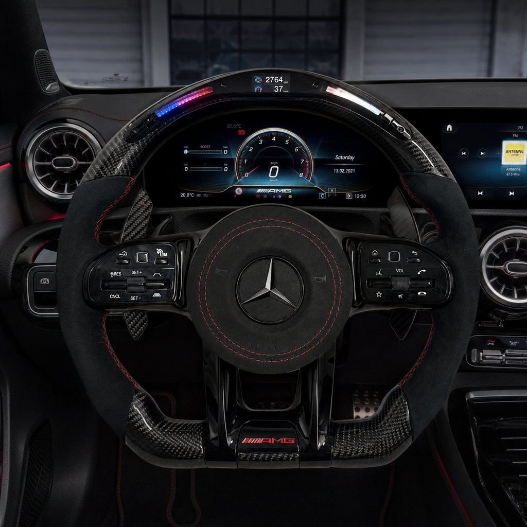 Mercedes AMG carbon fiber steering wheel with LED shift light, Alcantara grips and red stitching installed in W205 C63 C43 interior by CJ Mod Garage