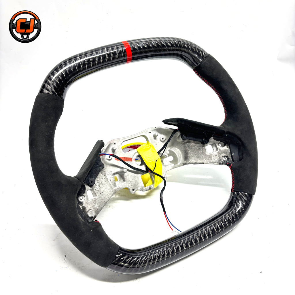 custom Corvette C8 style steering wheel rear view with gloss carbon fiber red center stripe black suede grips red stitching aluminum frame and exposed wiring
