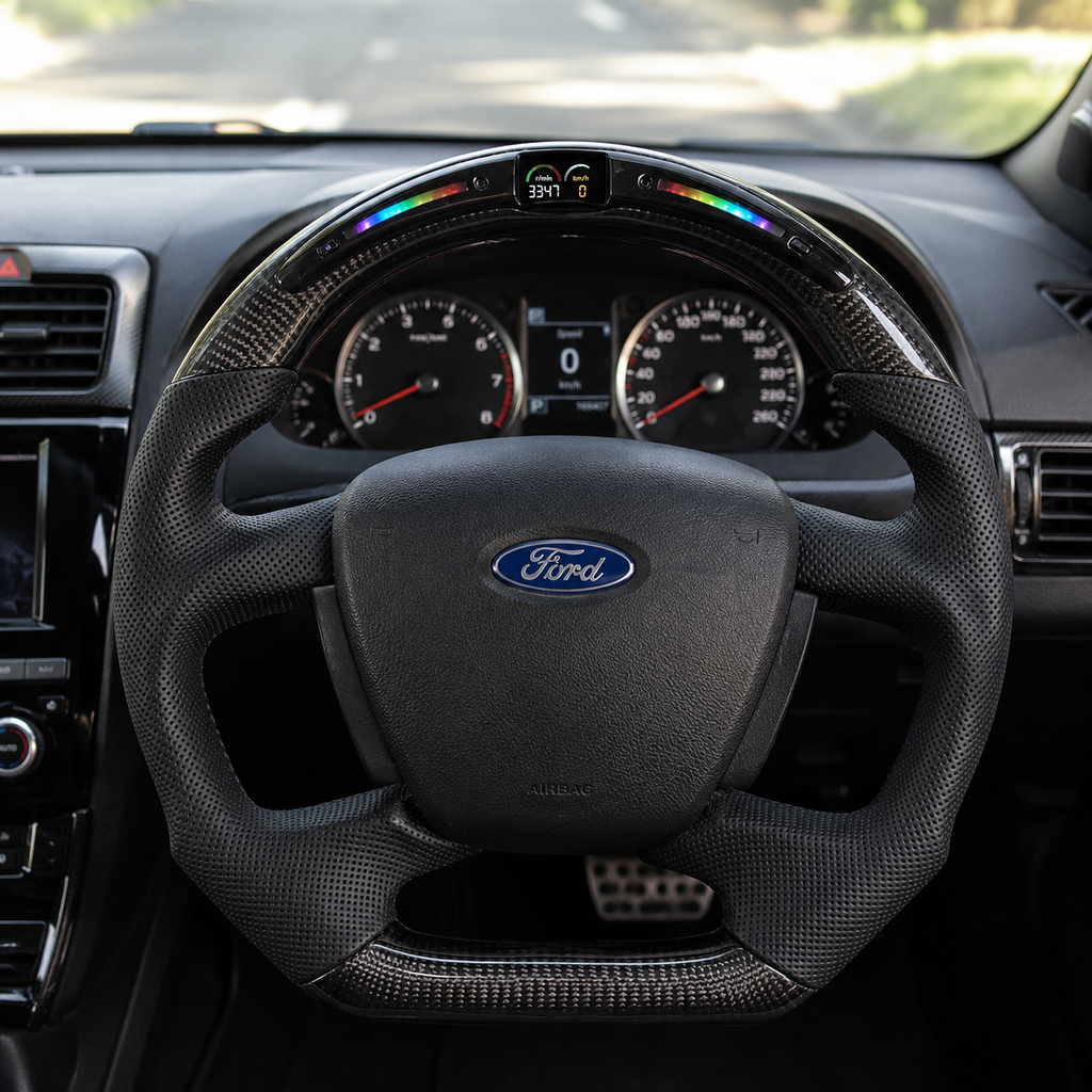 Ford Falcon FG XR XR6 XR8 LED steering wheel in-car photo with gloss carbon fiber and black perforated leather by CJ Mod Garage