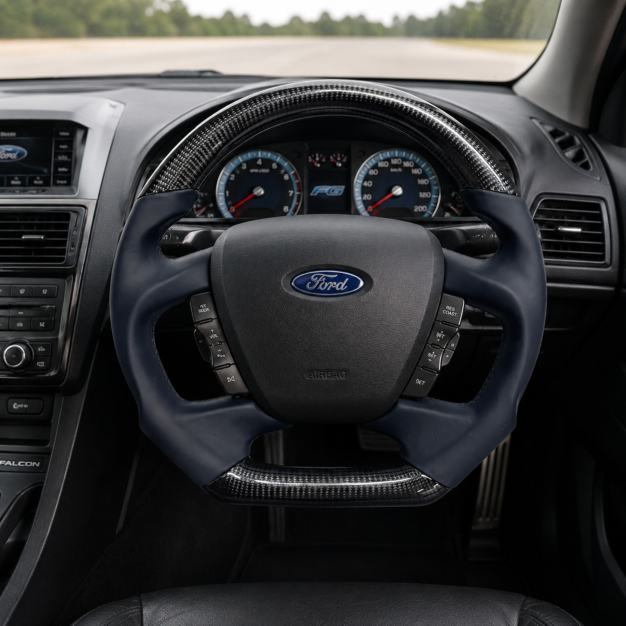 Ford Falcon FG XR6 XR8 custom steering wheel with gloss carbon fiber top and bottom sections, smooth leather grips and flat-bottom sport profile by CJ Mod Garage