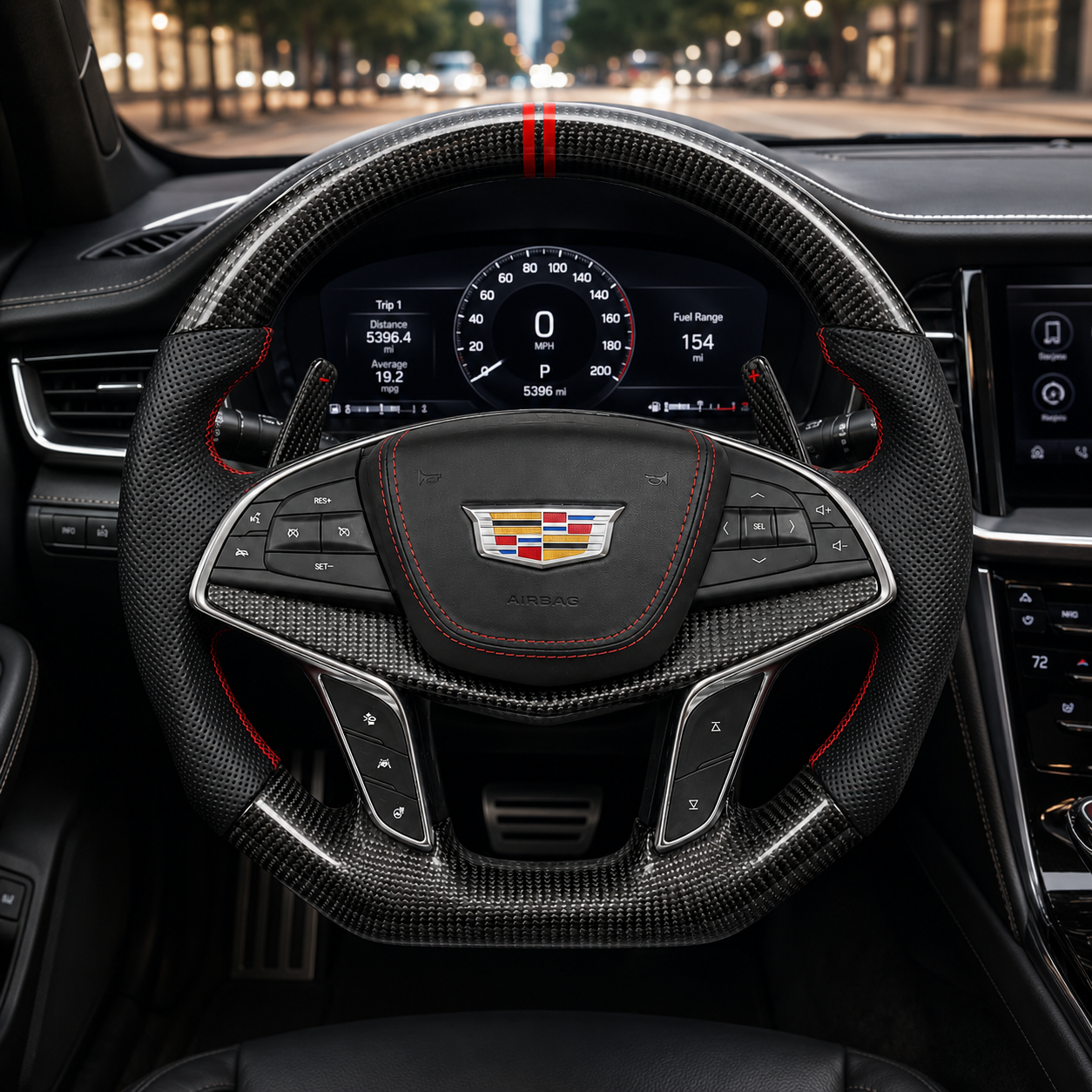 Cadillac XT5 CT6 carbon fiber perforated leather steering wheel with red stitching in cabin by CJ Mod Garage