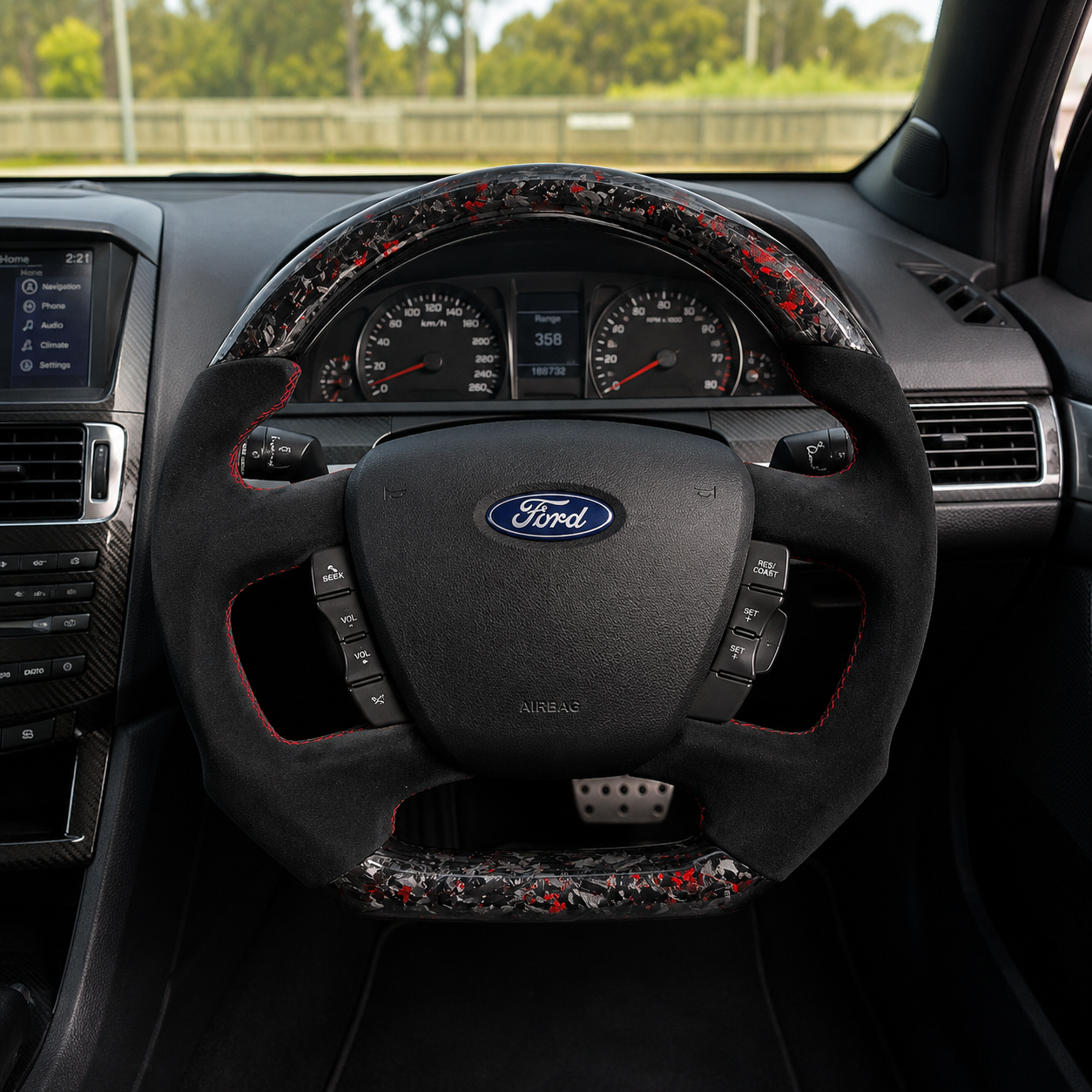 Ford Falcon FG XR XR6 XR8 custom steering wheel installed in car with red flake forged carbon black Alcantara and red stitching by CJ Mod Garage