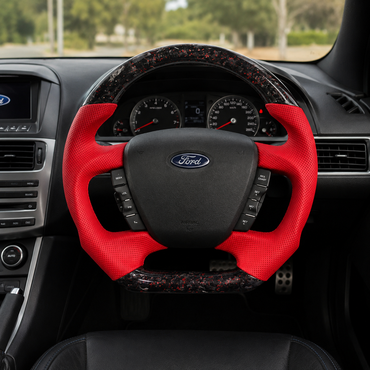 Ford Falcon FG XR XR6 XR8 custom steering wheel installed in car with red flake forged carbon and red perforated leather by CJ Mod Garage