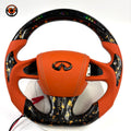 Infiniti Q50 Q60 custom forged carbon steering wheel featuring orange leather grips real gold flake carbon LED RPM display and flat bottom design by CJ Mod Garage