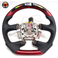 Front view of Ford Falcon FG XR XR6 XR8 custom steering wheel with LED display red carbon fiber and black perforated leather by CJ Mod Garage