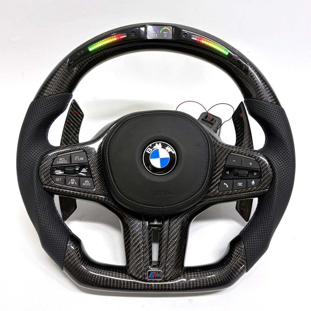 BMW M performance steering wheel with gloss carbon fiber finish, LED display module and perforated leather grips for G11 G12 G15 G28 G38 G82 F40 by CJ Mod Garage