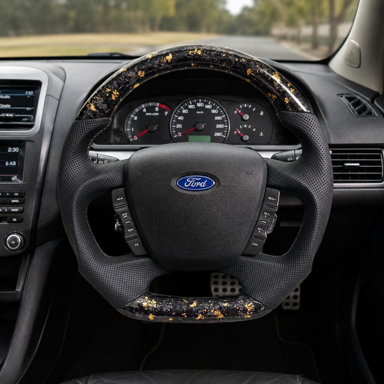 Ford Falcon FG XR XR6 XR8 custom steering wheel installed in car with gold flake forged carbon and black perforated leather by CJ Mod Garage