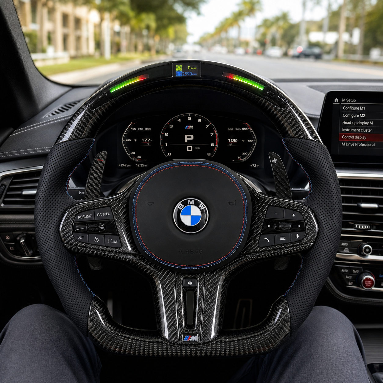 BMW LED carbon fiber steering wheel with perforated leather grips and M tricolor stitching installed in G80 M3 cabin for G20 G30 G82 F90 by CJ Mod Garage