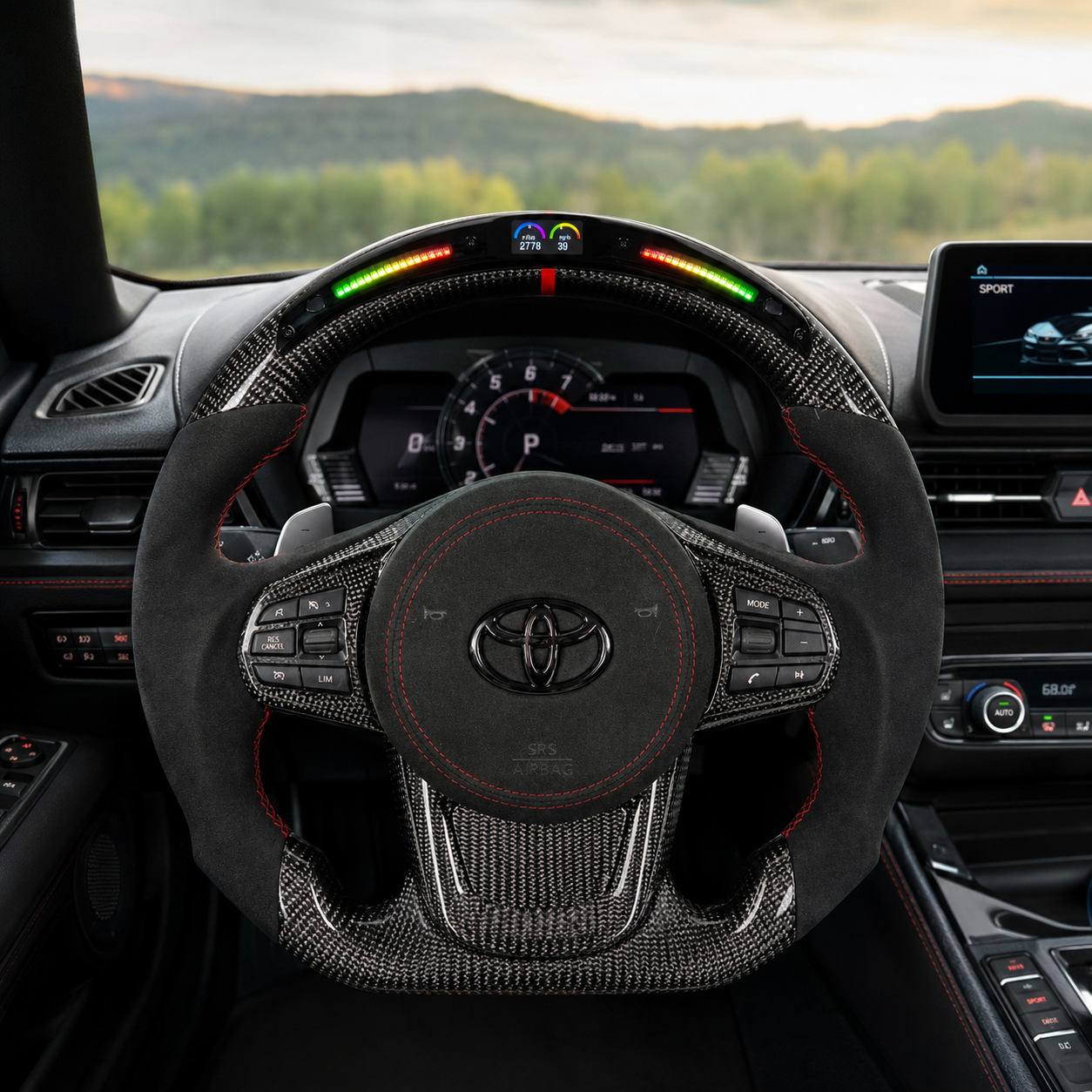 Toyota GR Supra A90 A91 carbon fiber steering wheel with LED shift lights, Alcantara grips, red stitching and motorsport-inspired cockpit view by CJ Mod Garage