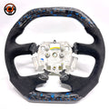 Front view of Ford Falcon FG XR XR6 XR8 custom steering wheel with blue flake forged carbon and black Alcantara by CJ Mod Garage