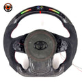 Toyota GR Supra A90 A91 performance steering wheel built with carbon fiber construction, LED RPM indicator, Alcantara grip sections and red center marker by CJ Mod Garage