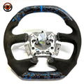 Front view of Ford Falcon FG XR XR6 XR8 custom steering wheel with blue flake forged carbon blue center stripe and black Alcantara by CJ Mod Garage