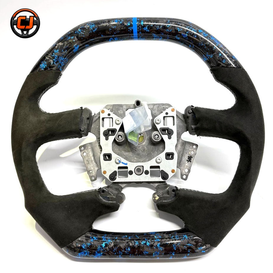 Front view of Ford Falcon FG XR XR6 XR8 custom steering wheel with blue flake forged carbon blue center stripe and black Alcantara by CJ Mod Garage