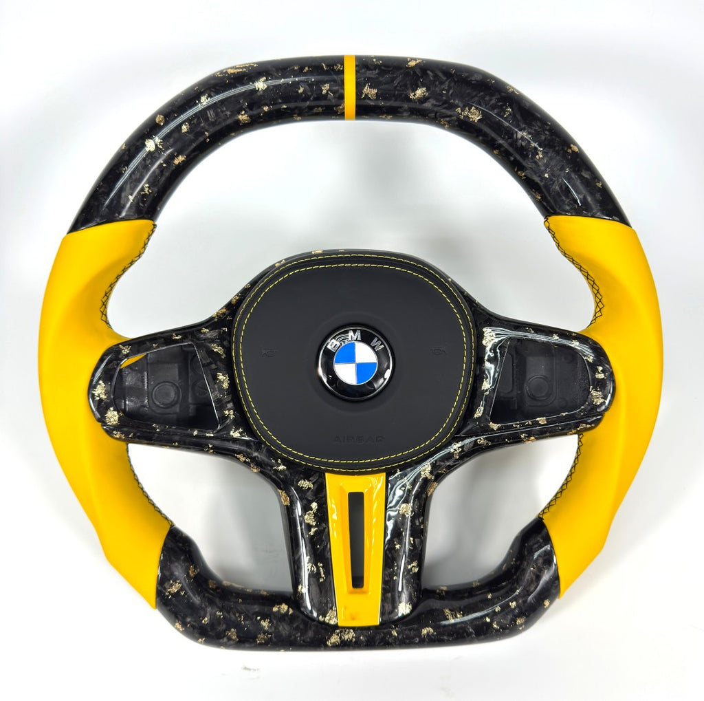 BMW custom forged carbon fiber steering wheel with yellow leather sides, contrast stitching and flat-bottom design for G22 G28 G38 G80 G82 F90 by CJ Mod Garage