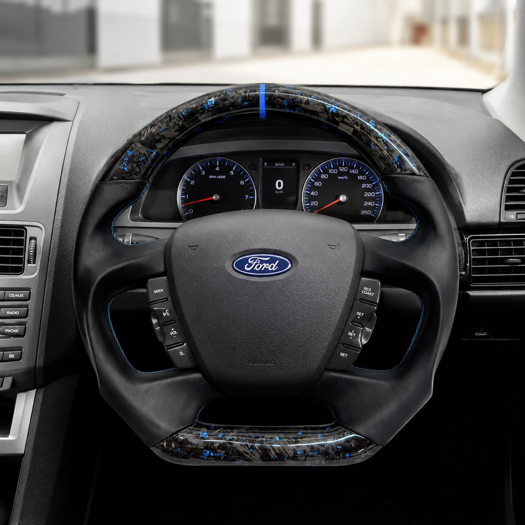 Ford Falcon FG XR XR6 XR8 custom steering wheel installed in car with blue flake forged carbon blue center stripe and smooth black leather by CJ Mod Garage