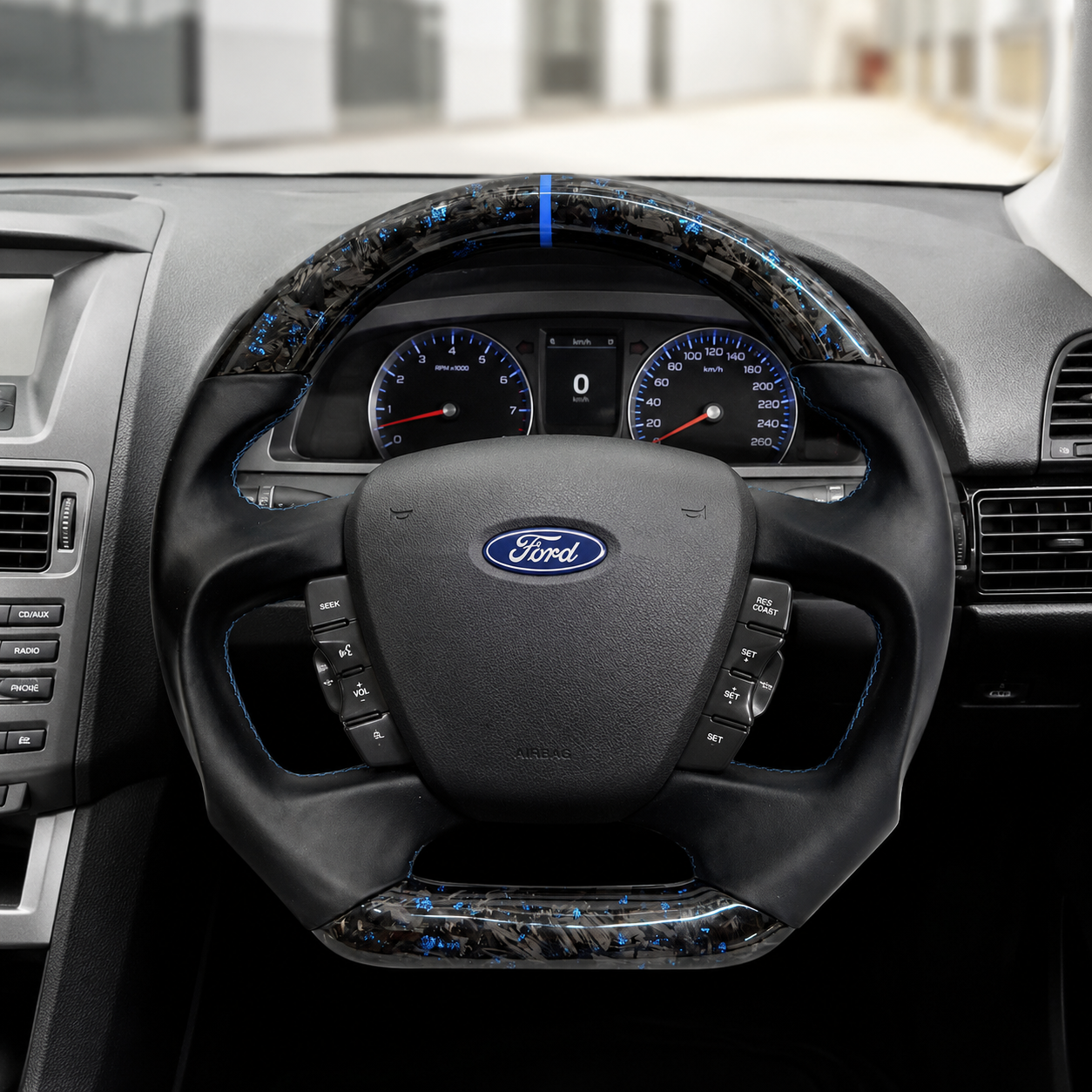 Ford Falcon FG XR XR6 XR8 custom steering wheel installed in car with blue flake forged carbon blue center stripe and smooth black leather by CJ Mod Garage