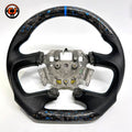 Front view of Ford Falcon FG XR XR6 XR8 custom steering wheel with blue flake forged carbon blue center stripe and smooth black leather by CJ Mod Garage