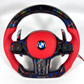 BMW flat-bottom carbon fiber steering wheel with red airbag cover, LED display and carbon paddle shifters for G22 G28 G38 G80 G82 F90 by CJ Mod Garage