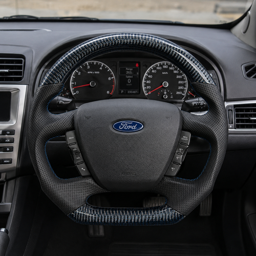 Ford Falcon FG XR XR6 XR8 custom steering wheel installed in car with blue carbon fiber black perforated leather and blue stitching by CJ Mod Garage