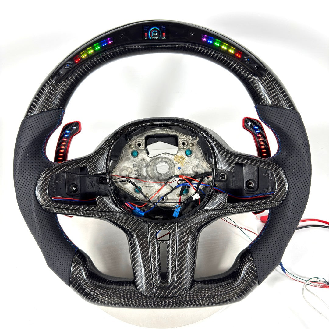 BMW flat-bottom carbon fiber steering wheel with illuminated paddle shifters and LED display for G09 G20 G30 G80 G82 F90 G05 G06 by CJ Mod Garage