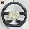 Front view of Ford Falcon FG XR XR6 XR8 custom steering wheel with blue carbon fiber black perforated leather and blue stitching by CJ Mod Garage