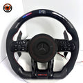 Mercedes AMG custom carbon fiber steering wheel featuring Alcantara side grips, digital LED display and paddle shifters for W117 W205 W218 C43 C63 by CJ Mod Garage
