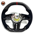 Nissan GT R R35 performance steering wheel featuring glossy carbon fiber Alcantara side grips flat bottom design and motorsport inspired styling by CJ Mod Garage