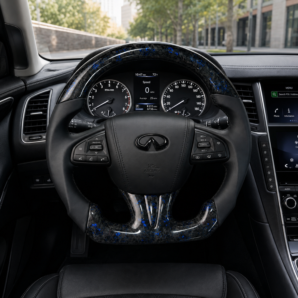 Infiniti Q50 custom blue forged carbon fiber steering wheel installed in luxury cockpit with smooth leather grips and OEM controls by CJ Mod Garage