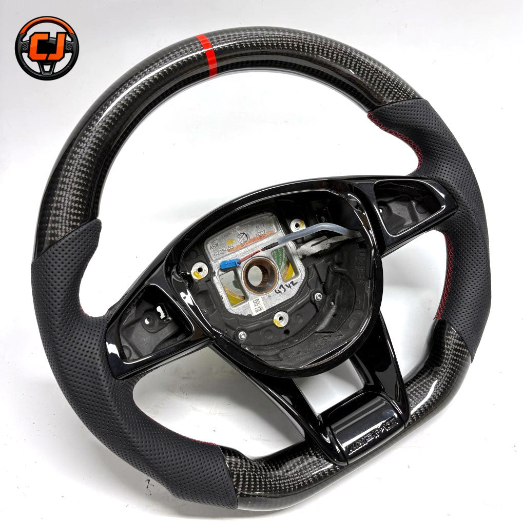Mercedes-Benz W205 AMG custom carbon fiber steering wheel with perforated leather, red stitching and flat-bottom design by CJ Mod Garage.