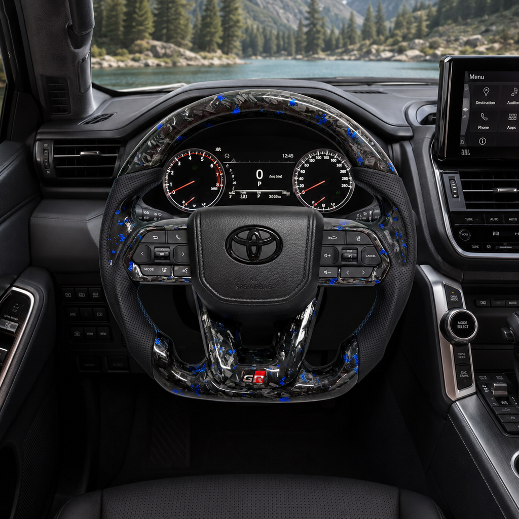 Toyota Land Cruiser LC300 custom steering wheel with blue forged carbon material perforated leather grips GR sport lower spoke and premium interior upgrade by CJ Mod Garage
