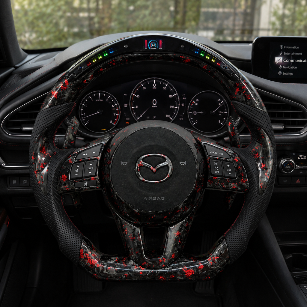 Custom Mazda 3 Axela LED steering wheel in vehicle interior with forged carbon red flakes red stitching multifunction buttons and paddle shifters