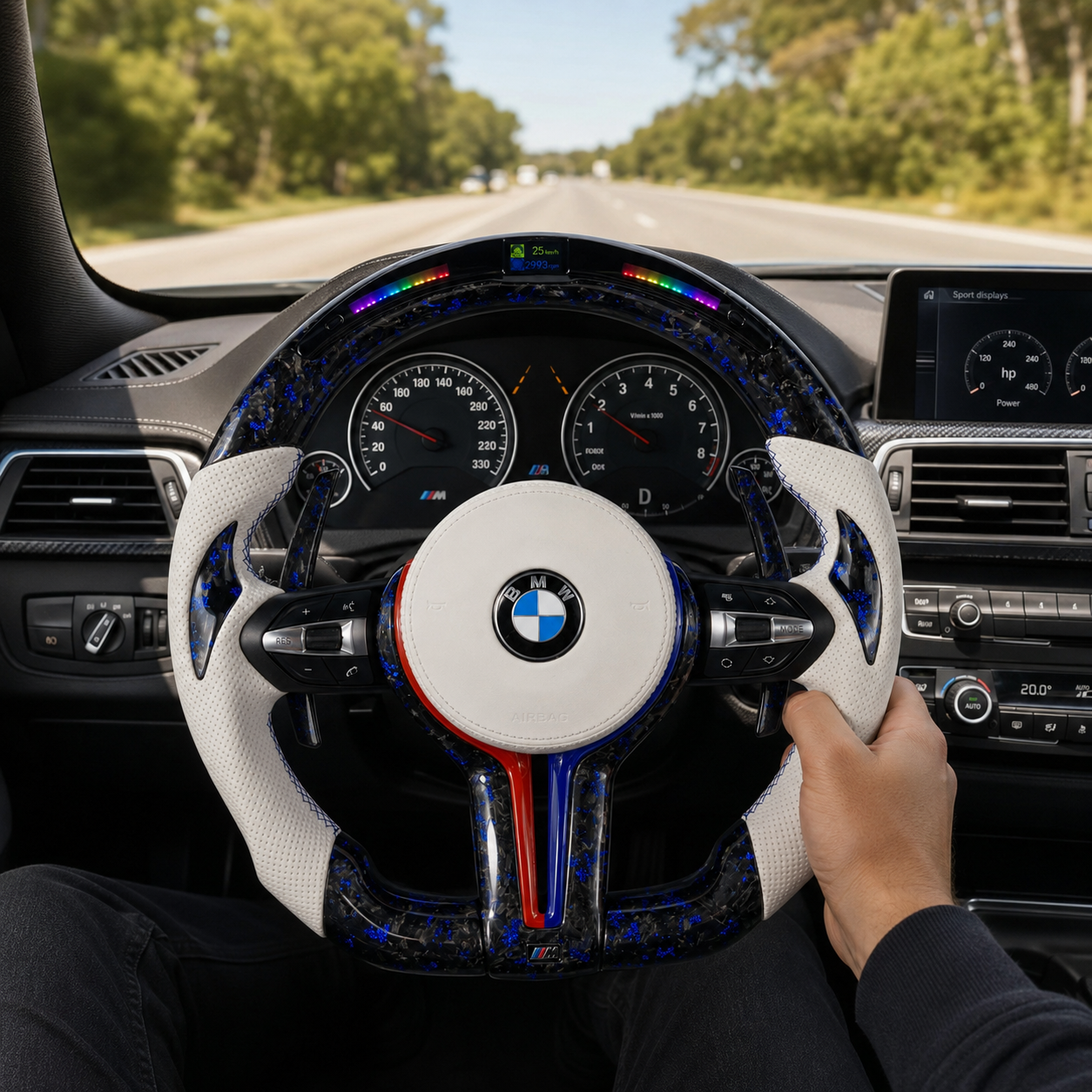 Custom BMW forged carbon fiber steering wheel with blue flakes and LED shift display installed in BMW F10 F11 F15 F18 F20 F23 F25 F30 F32 F35 F40 F80 E84 E87 E90 E92 E93 performance interior
