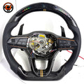 Handcrafted Seat Leon MK4 carbon fiber steering wheel with integrated buttons paddle shifters perforated leather grip and performance inspired styling by CJ Mod Garage