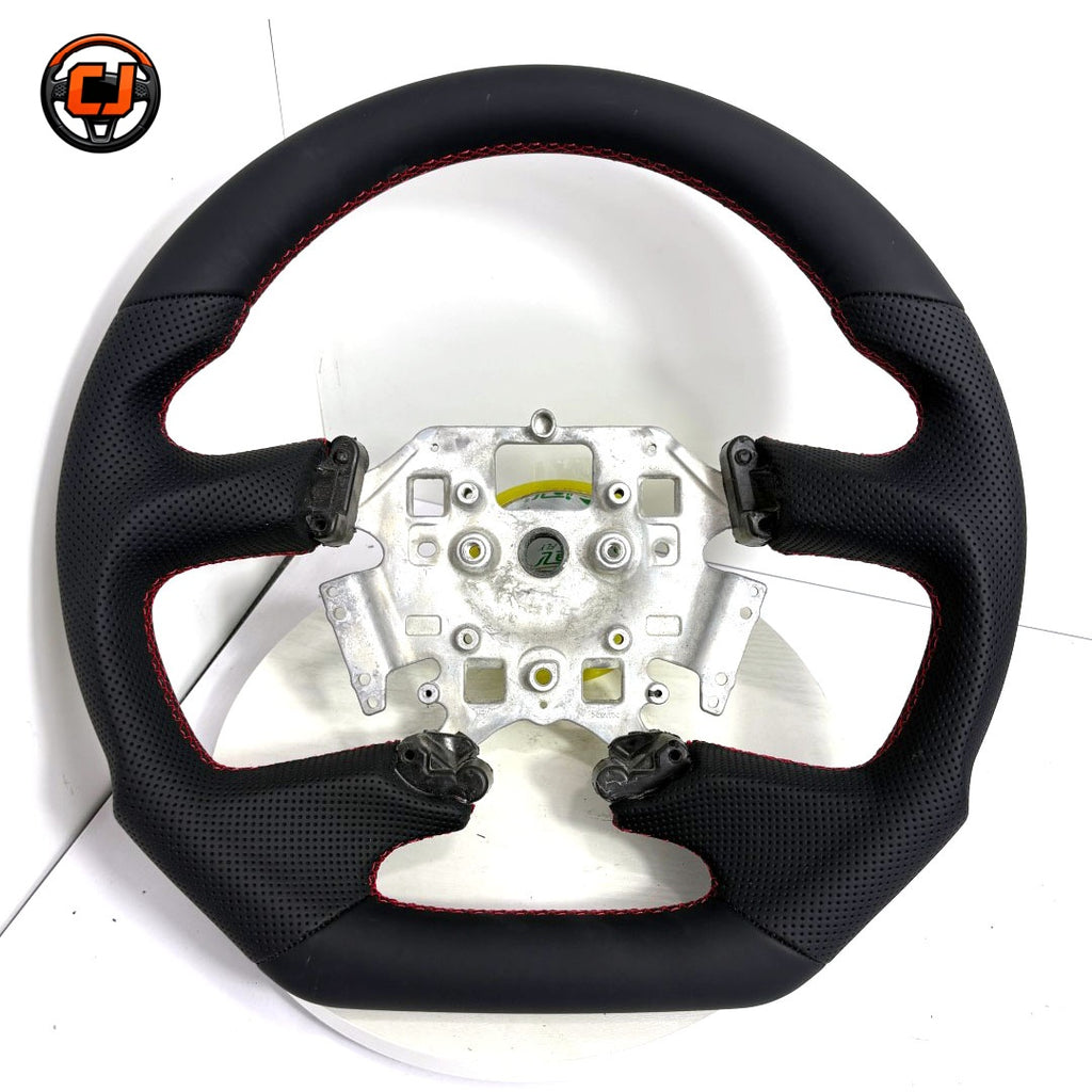 Front view of Ford Falcon FG XR XR6 XR8 custom steering wheel with smooth black leather perforated grips and red stitching by CJ Mod Garage