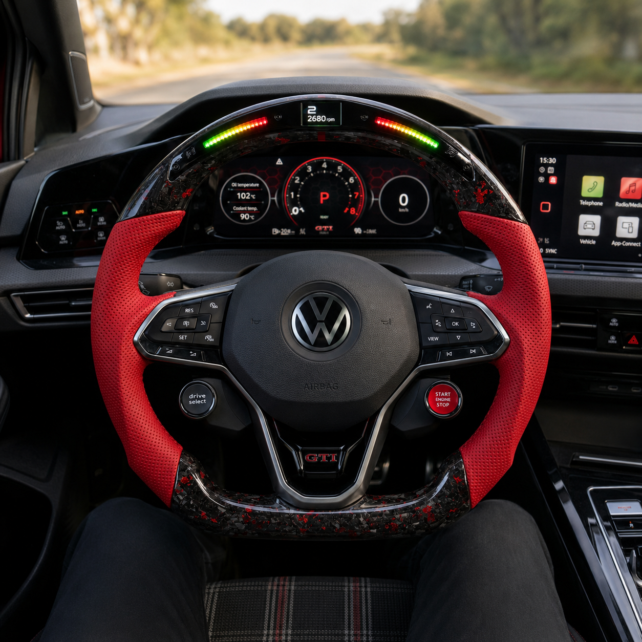 LED display forged carbon steering wheel with red perforated leather grips installed in cockpit for Golf 8 MK8 Passat Touareg Tiguan Polo GTD MK7 MK6 R Line CC Jetta by CJ Mod Garage