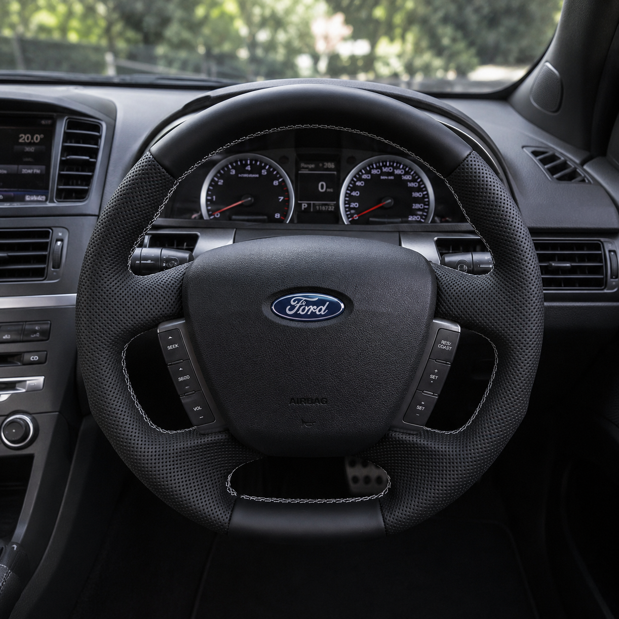 Ford Falcon FG XR XR6 XR8 custom steering wheel installed in car with smooth black leather perforated side grips and white stitching by CJ Mod Garage