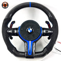Blue accent BMW custom carbon fiber steering wheel with Alcantara grips, multifunction controls, illuminated paddle shifters, and sport round airbag design for BMW F10 F11 F15 F18 F20 F23 F25 F30 F32 F35 F40 F80 E84 E87 E90 E92 E93