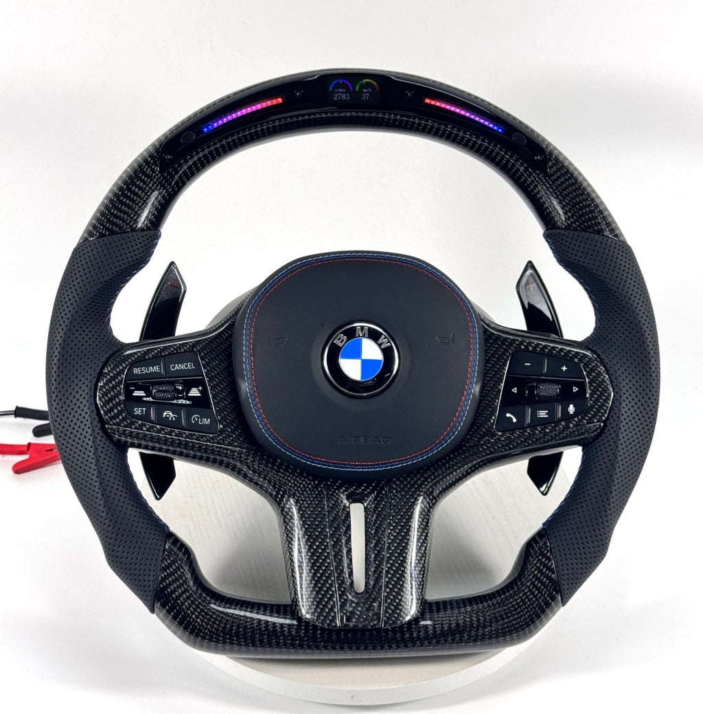 BMW performance steering wheel featuring illuminated LED indicator, premium carbon fiber and ergonomic leather handles for G02 G05 G06 G20 G28 G80 G82 F40 F90 by CJ Mod Garage