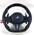 BMW performance steering wheel featuring illuminated LED indicator, premium carbon fiber and ergonomic leather handles for G02 G05 G06 G20 G28 G80 G82 F40 F90 by CJ Mod Garage