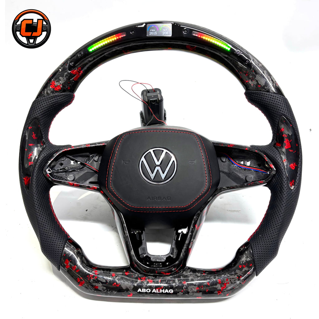 Hand built steering wheel with forged carbon red flakes perforated leather sections illuminated shift lights and premium airbag cover for Golf 8 MK8 Passat Touareg Tiguan Polo GTD MK7 MK6 R Line CC Jetta by CJ Mod Garage