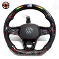Hand built steering wheel with forged carbon red flakes perforated leather sections illuminated shift lights and premium airbag cover for Golf 8 MK8 Passat Touareg Tiguan Polo GTD MK7 MK6 R Line CC Jetta by CJ Mod Garage