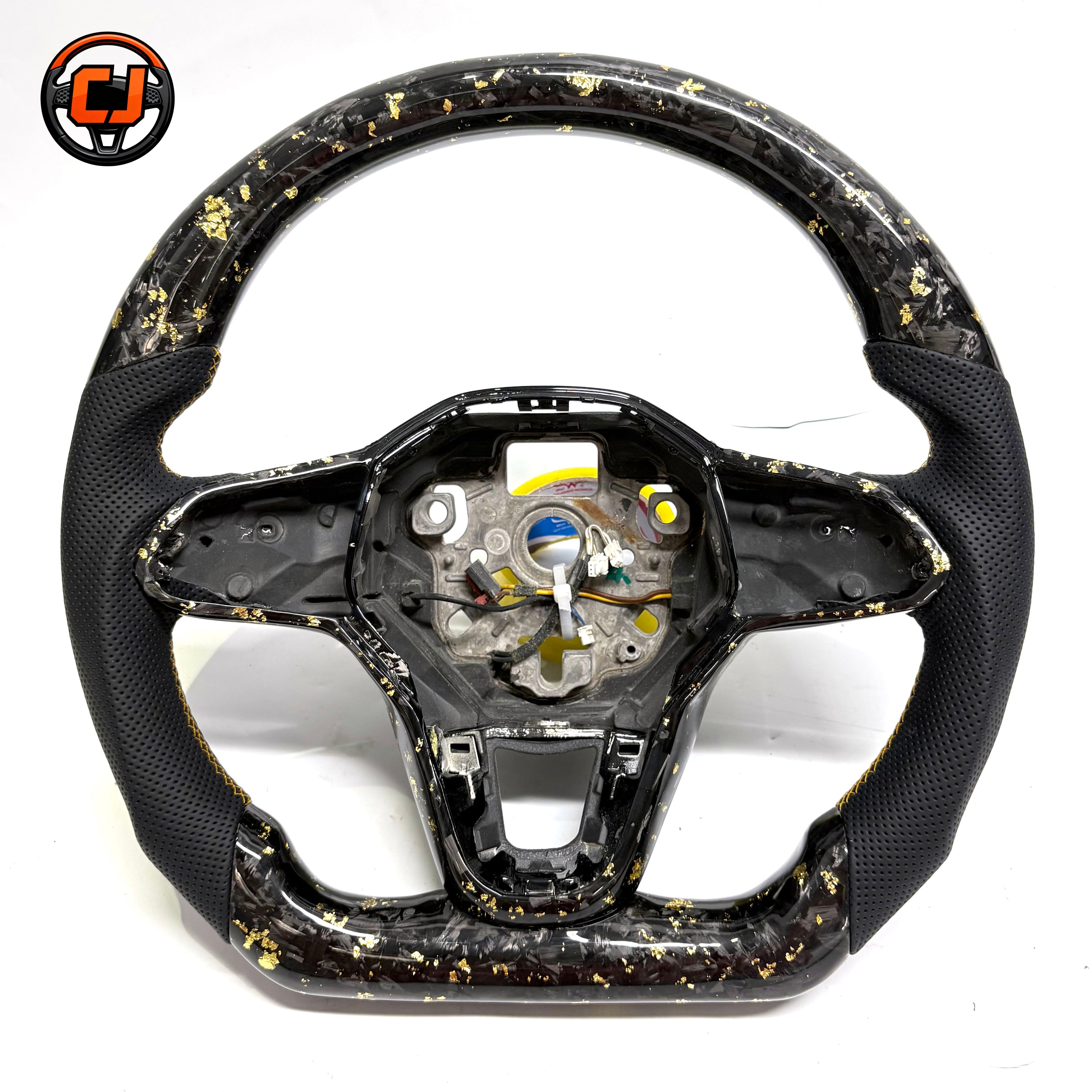 Handcrafted sport steering wheel with black forged carbon gold flake accents perforated side grips and OEM fitment for Golf 8 MK8 Passat Touareg Tiguan Polo GTD MK7 MK6 R Line CC Jetta by CJ Mod Garage