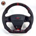Custom Ford Focus RS ST forged carbon steering wheel with red forged carbon accents, ergonomic leather grip areas, ST200 lower trim and premium handcrafted finish by CJ Mod Garage