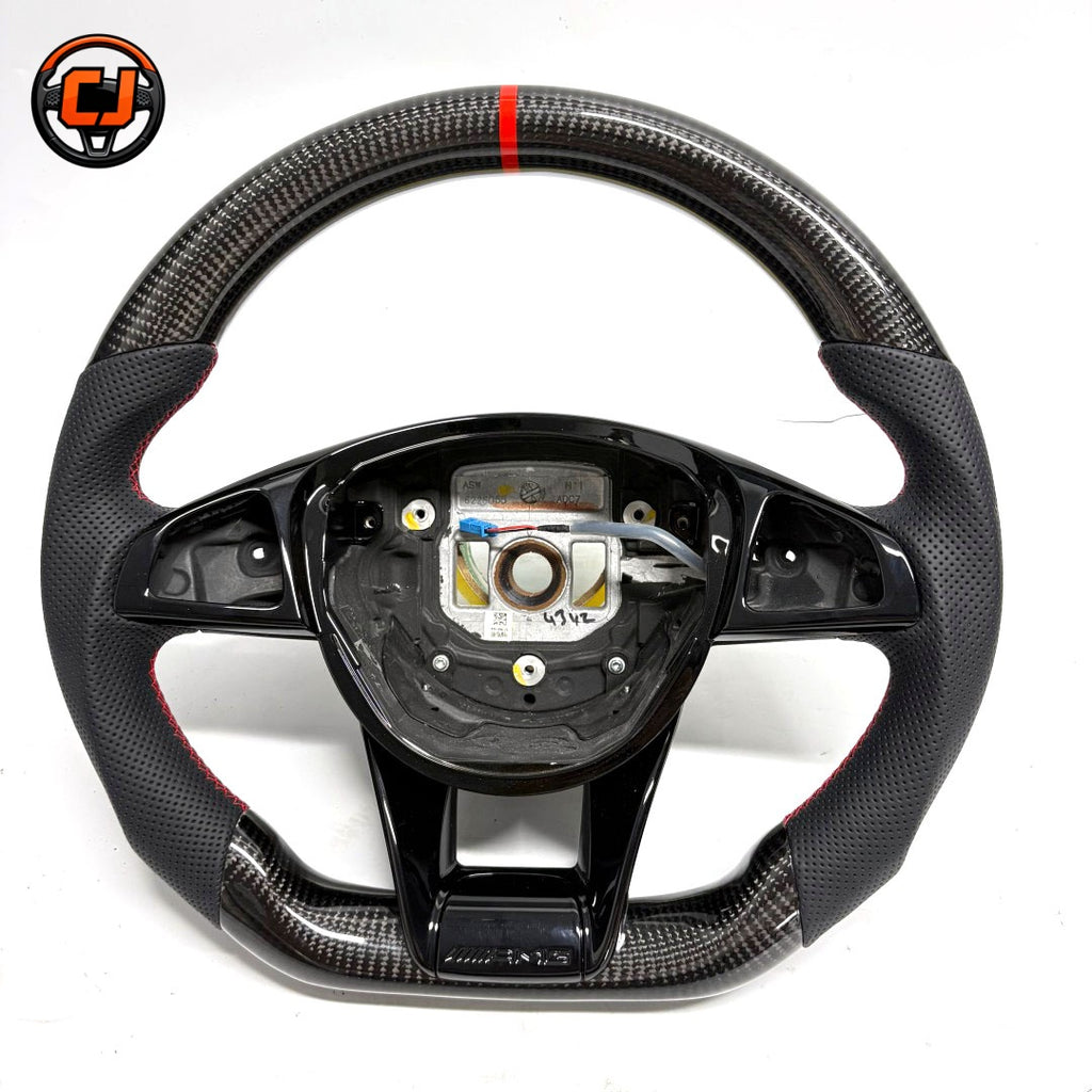 Custom Mercedes-Benz W205 AMG flat-bottom steering wheel with gloss carbon fiber, black perforated leather and red center stripe by CJ Mod Garage.