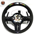 BMW F Series LED steering wheel with Alcantara wrap, carbon fiber paddle shifters, and integrated shift light display