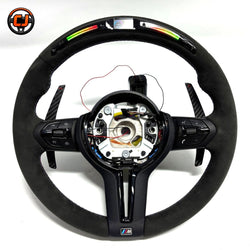 BMW F Series LED steering wheel with Alcantara wrap, carbon fiber paddle shifters, and integrated shift light display