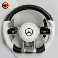 Mercedes AMG carbon fiber steering wheel with white leather airbag cover and multifunction controls for W176 W177 W204 W205 C43 C63 by CJ Mod Garage