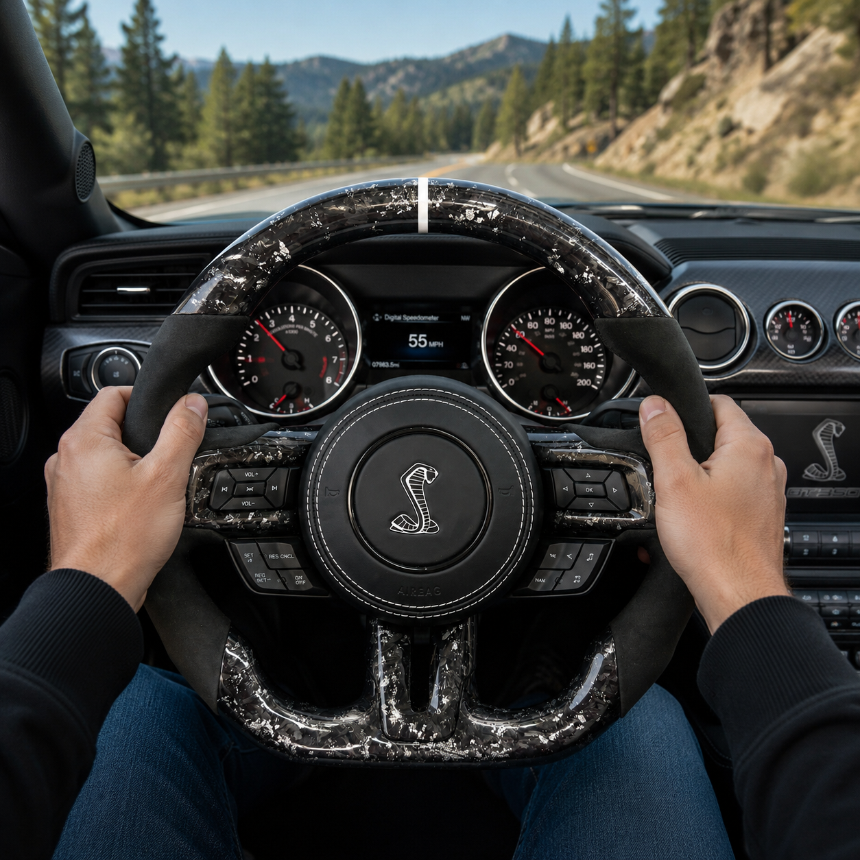FOR Ford Mustang S550/GT 2015-2023 Carbon Fiber Steering Wheel - Silver Forged Carbon Fiber & Black Alcantara & Shelby Airbag Cover - CJ Mod Garage & Driving Scene Images