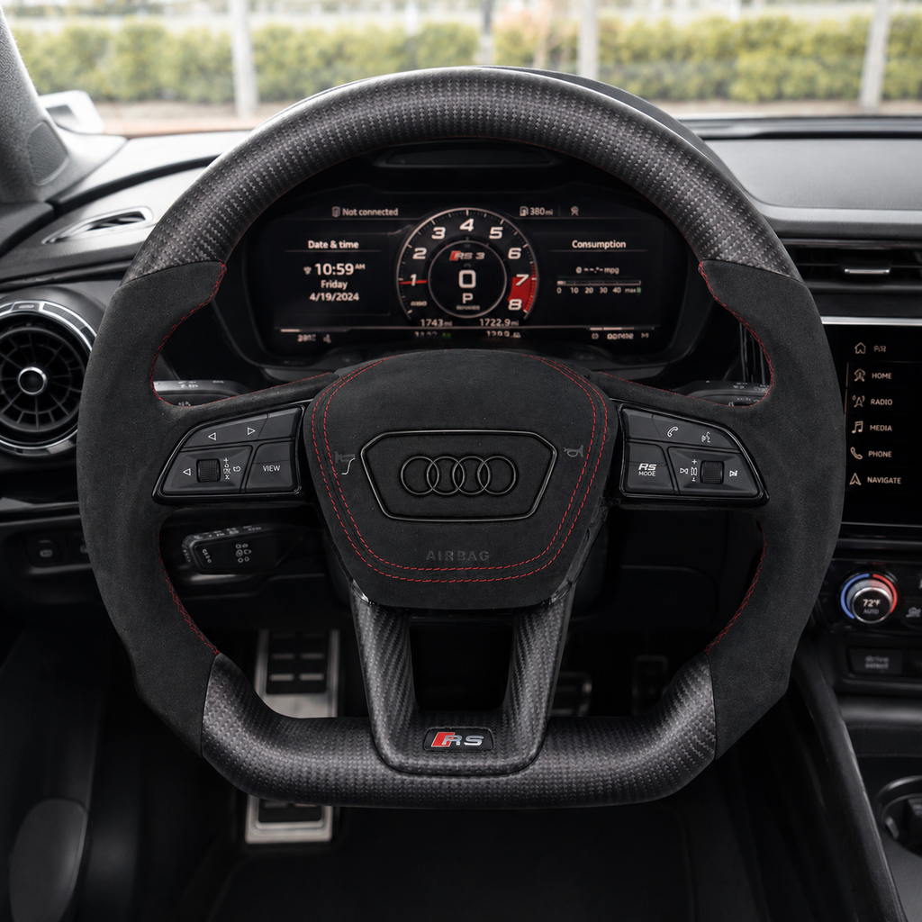 Front interior view of Audi matte carbon fiber sport steering wheel with Alcantara airbag cover and red stitching fits A3 2021 to 2025 A4 A4L 2020 to 2025